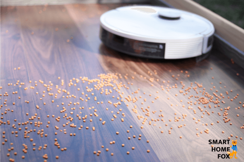 Deebot  N8 vacuums lentils on a hardwood floor